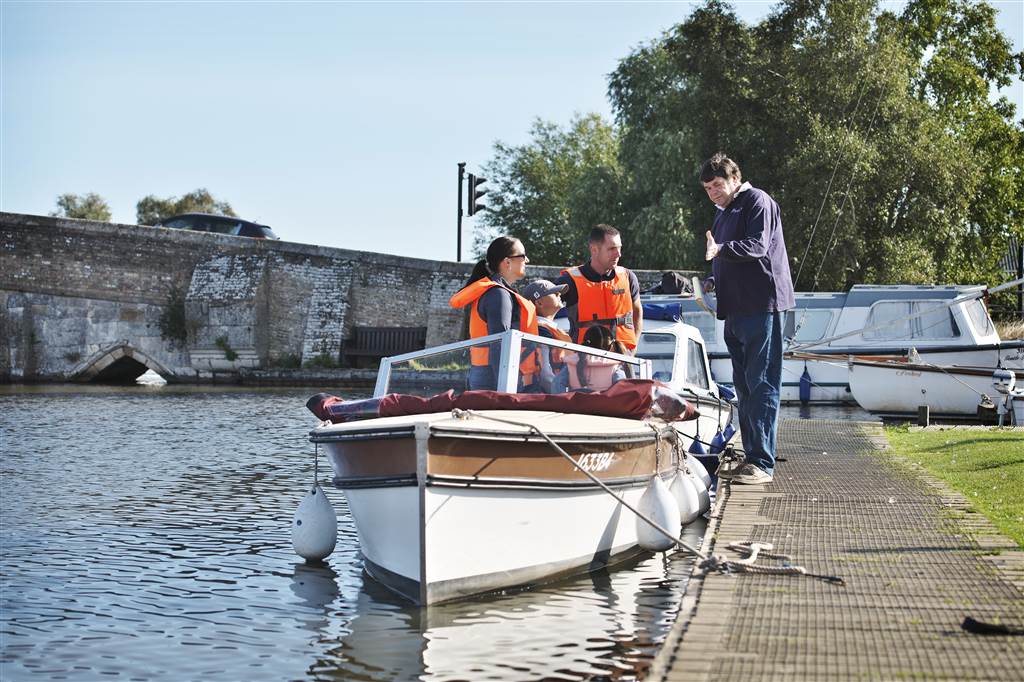 Visitors having an explanation as they are about to set off on an electric day boat